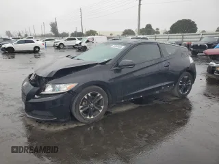 2015 Honda CR-Z with VIN JHMZF1D40FS003453, listed as a Copart auction lot 42036005 with 60,971 mi miles and Salvage Title. Bid and sale history available at carsss.com. Image 1.