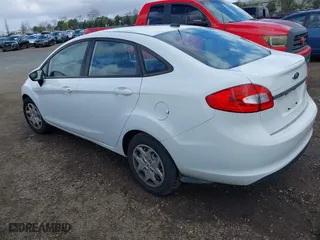 2013 Ford Fiesta S with VIN 3FADP4AJ3DM153816, listed as a IAAI auction lot 41598766 with 64,808 mi miles. Bid and sale history available at carsss.com. Image 3.