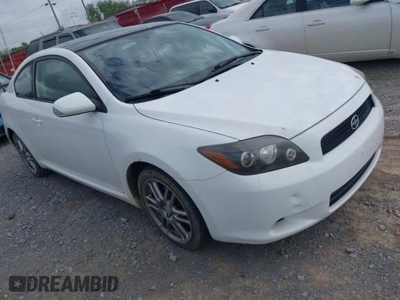 2010 Scion tC with VIN JTKDE3B79A0313508, listed as a IAAI auction lot 41970517 with 163,604 mi miles. Bid and sale history available at carsss.com. Image 1.