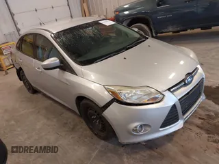 2012 Ford Focus SE with VIN 1FAHP3F22CL195777, listed as a IAAI auction lot 42370132 with 236,464 mi miles and . Bid and sale history available at DreamBid. Image 1.