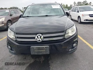 2012 Volkswagen Tiguan S with VIN WVGBV7AX6CW592242, listed as a IAAI auction lot 42215240 with 158,852 mi miles and . Bid and sale history available at DreamBid. Image 6.
