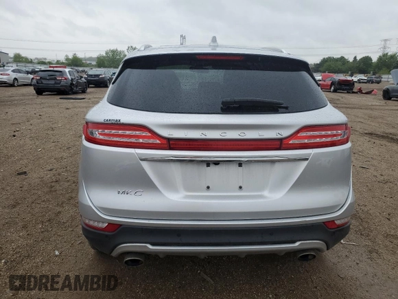 2019 Lincoln MKC Reserve with VIN 5LMCJ3D95KUL22724, listed as a Copart auction lot 56861795 with 59,275 mi miles and Salvage title. Bid and sale history available at DreamBid. Image 6.