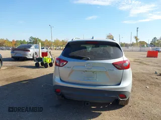 2016 Mazda CX-5 Grand Touring z VIN JM3KE2DY3G0712249, wystawiony jako IAAI lot #37910910 z przebiegiem 262 058 mil mil oraz . Historia ofert i sprzedaży dostępna na DreamBid. Obrazek 16.