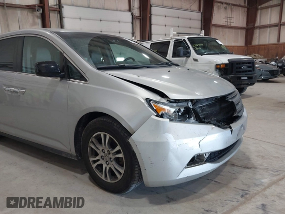2012 Honda Odyssey EX z VIN 5FNRL5H47CB045705, wystawiony jako IAAI lot #42384430 z przebiegiem 157 598 mil mil oraz . Historia ofert i sprzedaży dostępna na DreamBid. Obrazek 17.