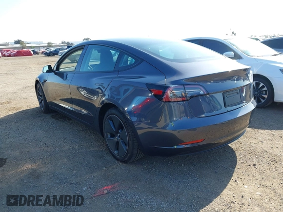 2023 Tesla Model 3 with VIN 5YJ3E1EA7PF447409, listed as a IAAI auction lot 41965416 with 40,033 mi miles and . Bid and sale history available at DreamBid. Image 3.