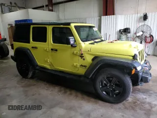 2023 Jeep Wrangler Willys with VIN 1C4HJXDN9PW640617, listed as a Copart auction lot 84894564 with 2,136 mi miles and Salvage Title. Bid and sale history available at DreamBid. Image 4.