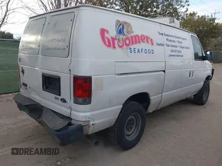 2011 Ford Econoline Cargo Commercial with VIN 1FTNE2EL6BDB25697, listed as a IAAI auction lot 41358472 with 384,517 mi miles. Bid and sale history available at carsss.com. Image 4.