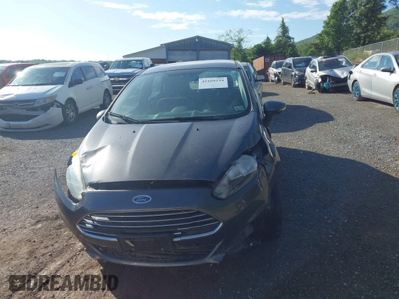 2016 Ford Fiesta SE z VIN 3FADP4BJ8GM184675, wystawiony jako IAAI lot #42169234 z przebiegiem 54 231 mil mil oraz . Historia ofert i sprzedaży dostępna na DreamBid. Obrazek 13.