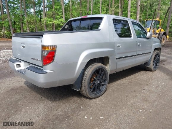 2006 Honda Ridgeline RTS with VIN 2HJYK16456H567706, listed as a IAAI auction lot 42109917 with 204,256 mi miles. Bid and sale history available at carsss.com. Image 4.