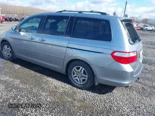 2007 Honda Odyssey EX with VIN 5FNRL38457B141956, listed as a IAAI auction lot 41818619 with 160,649 mi miles. Bid and sale history available at carsss.com. Image 3.