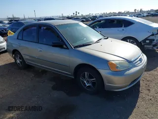2003 Honda Civic LX with VIN 2HGES16563H521654, listed as a IAAI auction lot 42094679 with 157,031 mi miles. Bid and sale history available at carsss.com. Image 1.