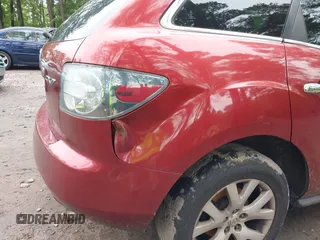 2007 Mazda CX-7 Sport z VIN JM3ER293470137299, wystawiony jako IAAI lot #42236564 z przebiegiem 179 510 mil mil oraz . Historia ofert i sprzedaży dostępna na DreamBid. Obrazek 12.