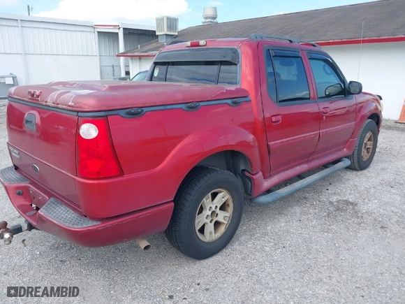 2005 Ford Explorer Sport Trac XLS with VIN 1FMZU67K75UA59323, listed as a IAAI auction lot 41996787 with 200,489 mi miles. Bid and sale history available at carsss.com. Image 4.