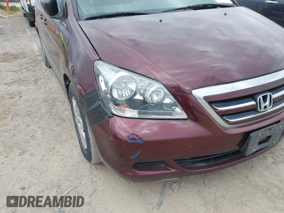 2007 Honda Odyssey LX with VIN 5FNRL38207B022095, listed as a IAAI auction lot 42395979 with 135,699 mi miles and . Bid and sale history available at DreamBid. Image 13.