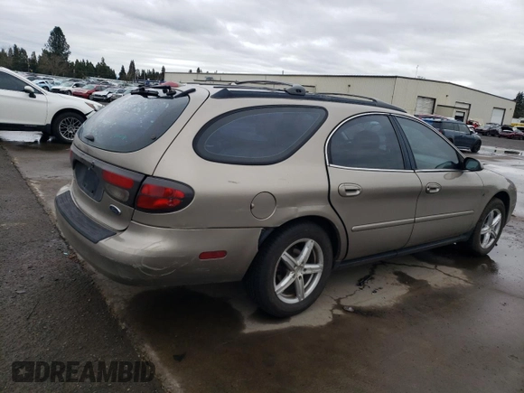 2002 Ford Taurus SE Standard z VIN 1FAFP58232G206714, wystawiony jako Copart lot #45911595 z przebiegiem 150 192 mil mil oraz Szkoda całkowita • Salvage title. Historia ofert i sprzedaży dostępna na DreamBid. Obrazek 3.