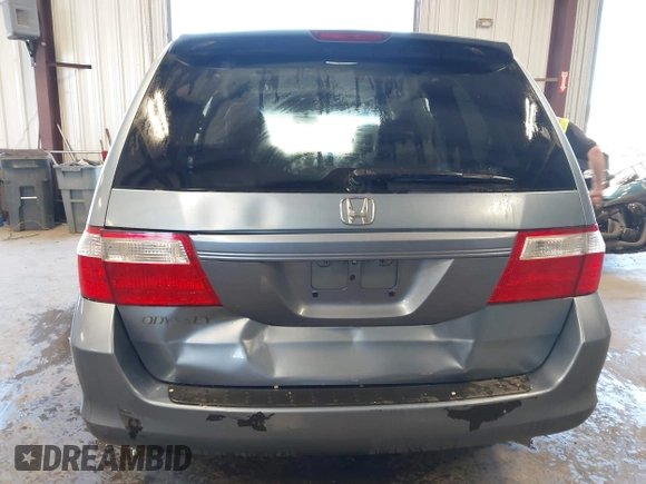 2007 Honda Odyssey EX-L z VIN 5FNRL38617B078923, wystawiony jako IAAI lot #42335122 z przebiegiem 154 352 mil mil oraz . Historia ofert i sprzedaży dostępna na DreamBid. Obrazek 16.