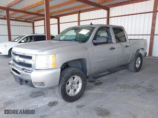 2010 Chevrolet Silverado 1500 LT with VIN 3GCRKSE31AG258718, listed as a IAAI auction lot 42061306 with 220,656 mi miles. Bid and sale history available at carsss.com. Image 21.