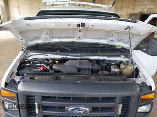 2012 Ford Econoline Cargo Commercial with VIN 1FTNE1EW3CDA31914, listed as a IAAI auction lot 41622154 with 99,254 mi miles and . Bid and sale history available at carsss.com. Image 10.