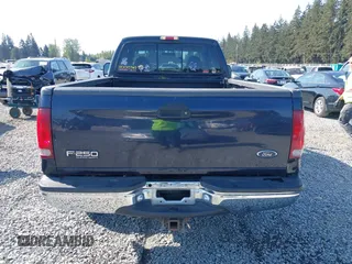 2000 Ford Super Duty F-250 XL with VIN 1FTNX21S5YEC82650, listed as a IAAI auction lot 42105861 with 155,878 mi miles. Bid and sale history available at carsss.com. Image 16.