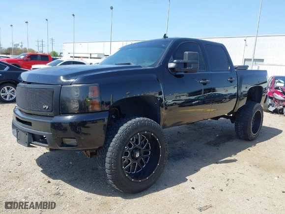 2011 Chevrolet Silverado 1500 LT with VIN 3GCPKSE37BG235632, listed as a IAAI auction lot 41827981 with 151,556 mi miles. Bid and sale history available at carsss.com. Image 2.