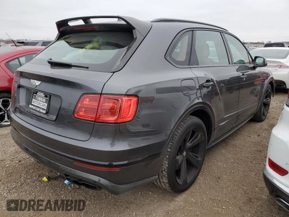 2019 Bentley Bentayga V8 z VIN SJAAM2ZV3KC027120, wystawiony jako Copart lot #83595274 z przebiegiem 28 972 mil mil oraz Szkoda całkowita • Salvage title. Historia ofert i sprzedaży dostępna na DreamBid. Obrazek 3.