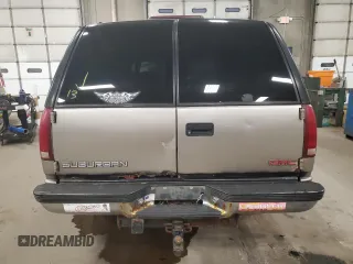 1999 GMC Suburban z VIN 3GKFK16R4XG540882, wystawiony jako Copart lot #80780884 z przebiegiem 209 819 mil mil oraz Czysty tytuł • Clean title. Historia ofert i sprzedaży dostępna na DreamBid. Obrazek 6.