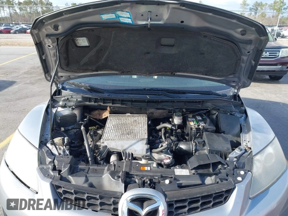 2009 Mazda CX-7 Sport with VIN JM3ER293690218999, listed as a IAAI auction lot 41706965 with 164,806 mi miles. Bid and sale history available at carsss.com. Image 10.