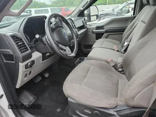 2018 Ford F-150 XL with VIN 1FTEW1E57JFC16425, listed as a Copart auction lot 61947945 with 110,364 mi miles and Salvage title. Bid and sale history available at DreamBid. Image 7.