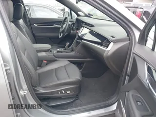 2025 Cadillac XT6 FWD Premium Luxury with VIN 1GYKPCRS4SZ119978, listed as a IAAI auction lot 41877109 with 13,579 mi miles. Bid and sale history available at carsss.com. Image 5.