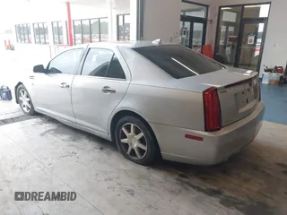 2011 Cadillac STS RWD with VIN 1G6DW6ED4B0120517, listed as a IAAI auction lot 41765069 with 120,059 mi miles and . Bid and sale history available at DreamBid. Image 3.