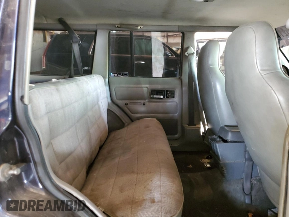 1996 Jeep Cherokee Sport with VIN 1J4FT68S1TL275271, listed as a Copart auction lot 72701214 with 235,651 mi miles and Salvage Title. Bid and sale history available at carsss.com. Image 10.