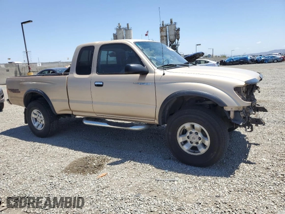 1999 Toyota Tacoma PreRunner with VIN 4TASN92N7XZ573079, listed as a Copart auction lot 56917035 with 254,939 mi miles and Salvage title. Bid and sale history available at DreamBid. Image 4.