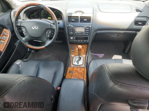 2003 Infiniti I35 Luxury z VIN JNKDA31A43T113863, wystawiony jako Copart lot #58551715 z przebiegiem 78 871 mil mil oraz Szkoda całkowita • Salvage title. Historia ofert i sprzedaży dostępna na DreamBid. Obrazek 8.