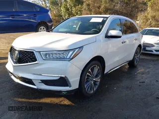 2020 Acura MDX w/Technology Pkg with VIN 5J8YD3H58LL003158, listed as a IAAI auction lot 41532982 with 125,585 mi miles. Bid and sale history available at carsss.com. Image 2.