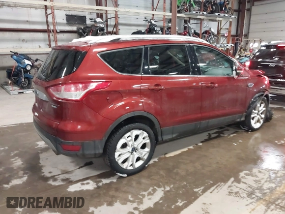2016 Ford Escape Titanium with VIN 1FMCU9JX6GUB57497, listed as a IAAI auction lot 41375019 with 1 mi miles. Bid and sale history available at carsss.com. Image 4.