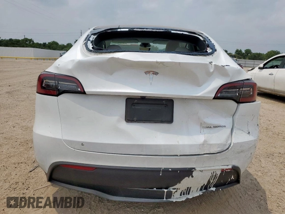 2024 Tesla Model Y Long Range with VIN 7SAYGDEE6RA290124, listed as a Copart auction lot 57662385 with 14,751 mi miles and Salvage title. Bid and sale history available at DreamBid. Image 6.