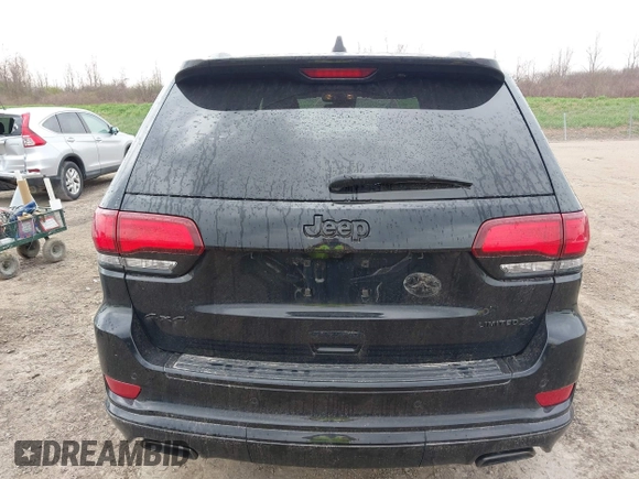 2021 Jeep Grand Cherokee 80th Anniversary with VIN 1C4RJFBG7MC828116, listed as a IAAI auction lot 42118355 with 57,240 mi miles and . Bid and sale history available at DreamBid. Image 17.