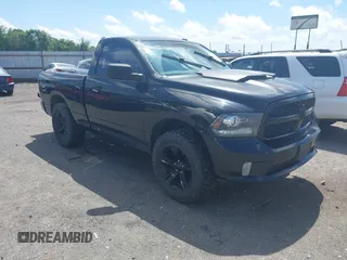 2013 Ram 1500 Tradesman z VIN 3C6JR7AT5DG592970, wystawiony jako IAAI lot #42136593 z przebiegiem 168 788 mil mil oraz . Historia ofert i sprzedaży dostępna na DreamBid. Obrazek 1.