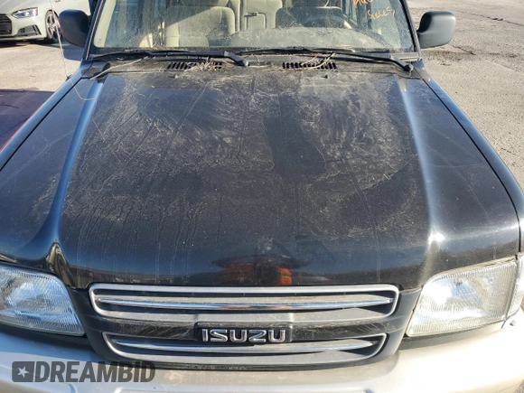 2001 Isuzu Trooper S z VIN JACDJ58X217J01836, wystawiony jako Copart lot #77548874 z przebiegiem Nie podano mil oraz Tytuł czysty. Historia ofert i sprzedaży dostępna na DreamBid. Obrazek 11.