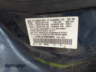 2009 Honda Odyssey EX-L with VIN 5FNRL38769B409281, listed as a IAAI auction lot 42013137 with 213,934 mi miles and . Bid and sale history available at DreamBid. Image 9.