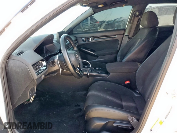 2023 Honda Civic Sport with VIN 2HGFE2F57PH511027, listed as a Copart auction lot 62703695 with 33,899 mi miles and Salvage title. Bid and sale history available at DreamBid. Image 7.