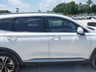 2019 Hyundai Santa Fe Limited z VIN 5NMS5CAA1KH136238, wystawiony jako IAAI lot #42314285 z przebiegiem 74 606 mil mil oraz . Historia ofert i sprzedaży dostępna na DreamBid. Obrazek 13.