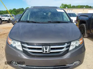 2015 Honda Odyssey Touring Elite z VIN 5FNRL5H97FB060981, wystawiony jako IAAI lot #42289631 z przebiegiem 160 947 mil mil oraz . Historia ofert i sprzedaży dostępna na DreamBid. Obrazek 12.