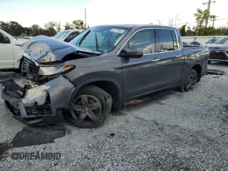 2023 Honda Ridgeline RTL-E with VIN 5FPYK3F79PB010418, listed as a Copart auction lot 62272845 with 39,739 mi miles and Salvage title. Bid and sale history available at DreamBid. Image 1.