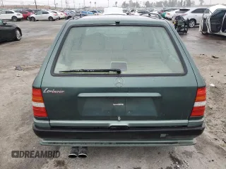 1993 Mercedes-Benz 300 with VIN WDBEA92E7PF259851, listed as a Copart auction lot 50561015 with 214,346 mi miles and Salvage Title. Bid and sale history available at DreamBid. Image 6.