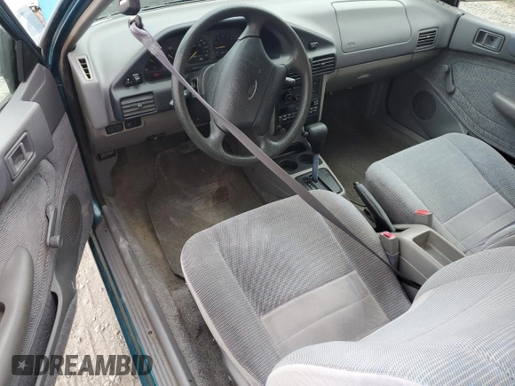 1996 Ford Escort z VIN 1FASP11J6TW170890, wystawiony jako Copart lot #49051905 z przebiegiem 133 671 mil mil oraz Czysty tytuł • Clean title. Historia ofert i sprzedaży dostępna na DreamBid. Obrazek 8.