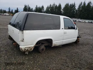 1997 Chevrolet Tahoe z VIN 3GNEC18R7VG122449, wystawiony jako Copart lot #85718304 z przebiegiem Nie podano mil oraz Szkoda całkowita • Salvage title. Historia ofert i sprzedaży dostępna na DreamBid. Obrazek 3.