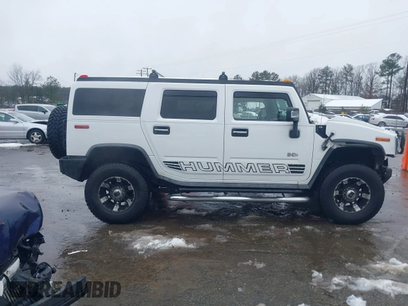 2007 Hummer H2 SUV z VIN 5GRGN23U07H111605, wystawiony jako IAAI lot #41575213 z przebiegiem 179 618 mil mil oraz . Historia ofert i sprzedaży dostępna na DreamBid. Obrazek 13.