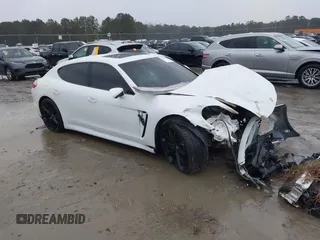 2013 Porsche Panamera with VIN WP0AA2A70DL013070, listed as a IAAI auction lot 41610596 with Not Provided miles and . Bid and sale history available at DreamBid. Image 1.