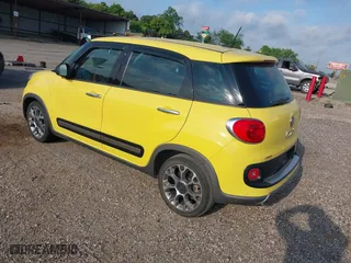 2014 FIAT 500L Trekking with VIN ZFBCFADH7EZ022679, listed as a IAAI auction lot 42053114 with 73,742 mi miles. Bid and sale history available at carsss.com. Image 3.